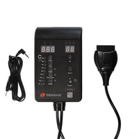 Black electronic device with digital display and cable on a white background