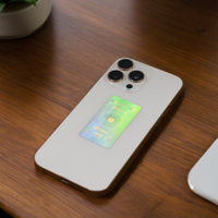 Phone case with a green label on a wooden surface
