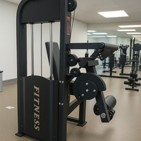 Black fitness machine labeled 'Fitness' in a gym setting