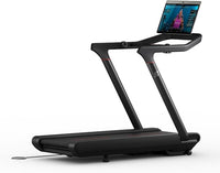 Treadmill with a tablet stand displaying a fitness app on a white background