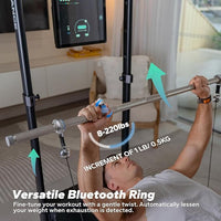 Person using a weightlifting bar with digital display in a home setting