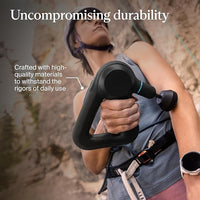 Person holding a black climbing device with text about durability and material quality.