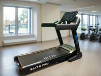 Treadmill with 'Elite Pro' branding in a gym setting