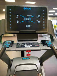 Treadmill control panel with digital display and buttons