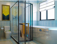 Modern bathroom with glass shower enclosure, bathtub, and toilet.