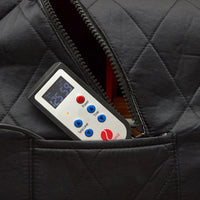 Digital thermometer in a quilted black jacket pocket