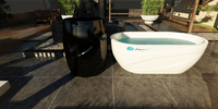 White hot tub with a visible brand logo on a tiled patio