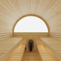 Wooden sauna interior with a large window and benches.