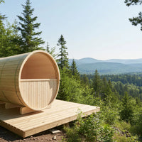 Wooden barrel-shaped structure on a platform with a forest and mountain background