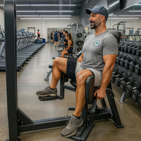 Man using a leg press machine in a gym setting