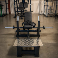 Gym bench with weight rack in a fitness center